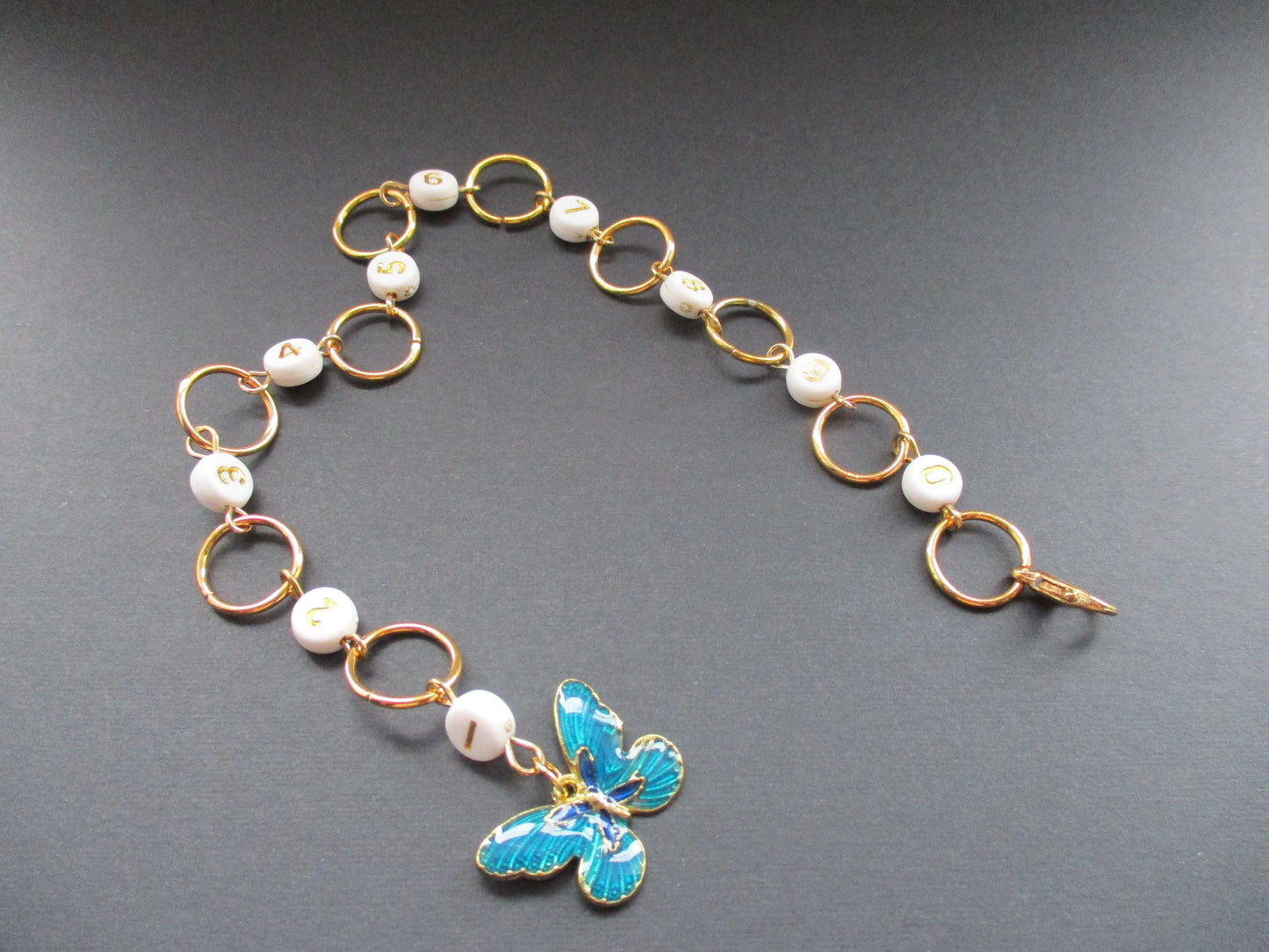 Butterfly stitch marker and row counter