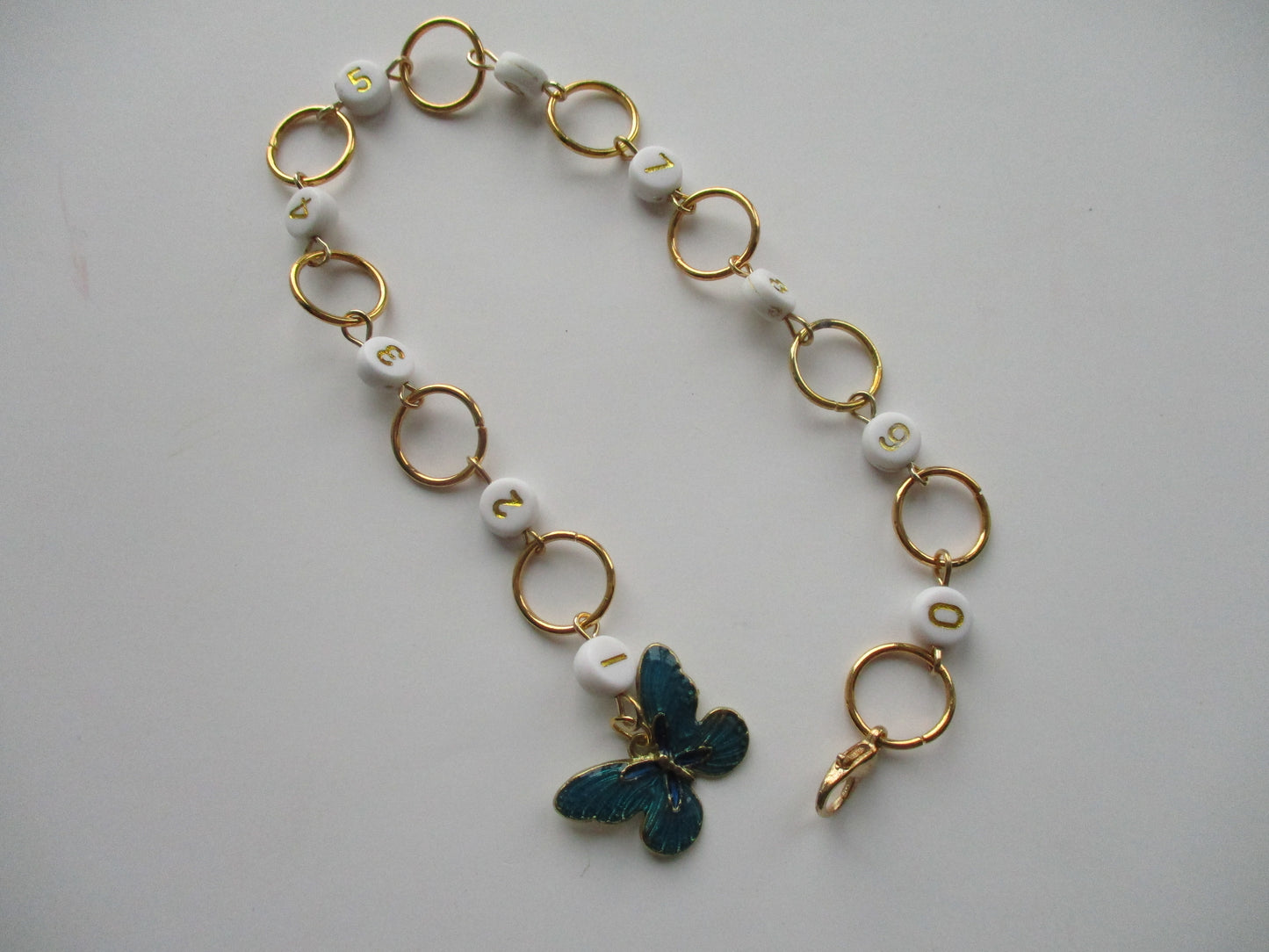 Butterfly stitch marker and row counter