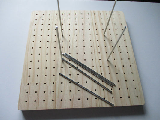 Wooden blocking board with dowels